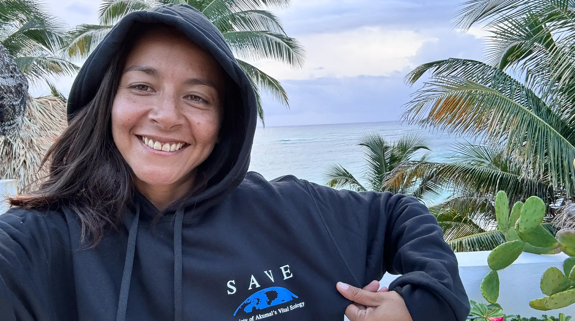 Yaz Ayuso wearing a SAVE hoodie in Akumal